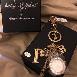 Baby phat bag decor with watch.